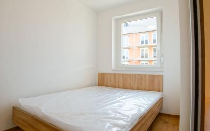 Na prenájom moderne zariadený 1,5-izbový byt v novostavbe s balkónom a parkovaním – Rajka